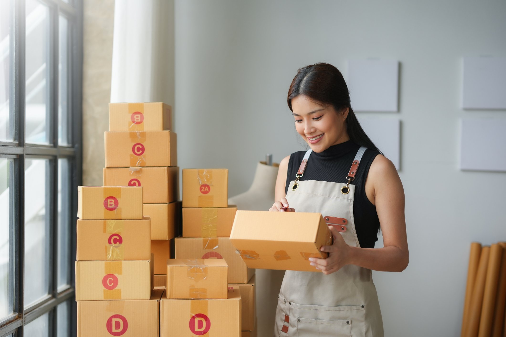 happy-store-associate-working-on-inventory